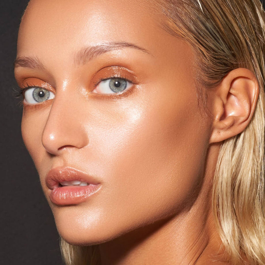 close up of model showcasing Danessa Myricks Original Beauty Oil