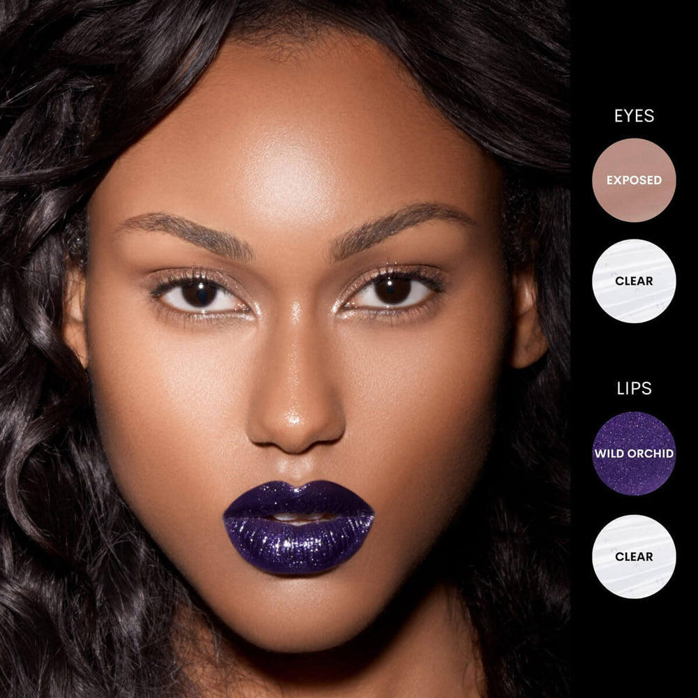 This is a model wearing the wild orchid metallic by colorfix on her lips that gives such a bold look