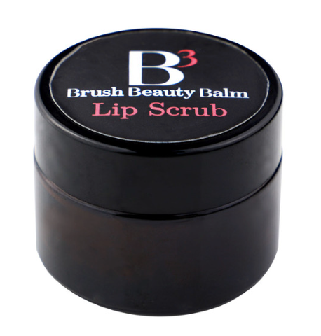 The B3 lip scrub container with black and white lid that has 3 and lip scrub in pink 