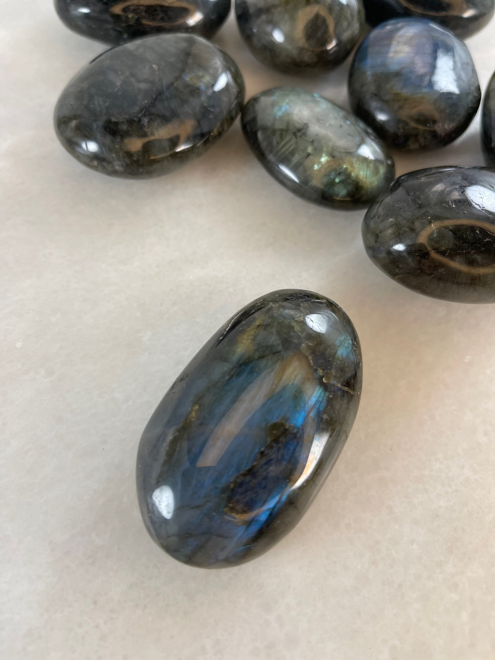 Labradorite Palm Stone with more in the back